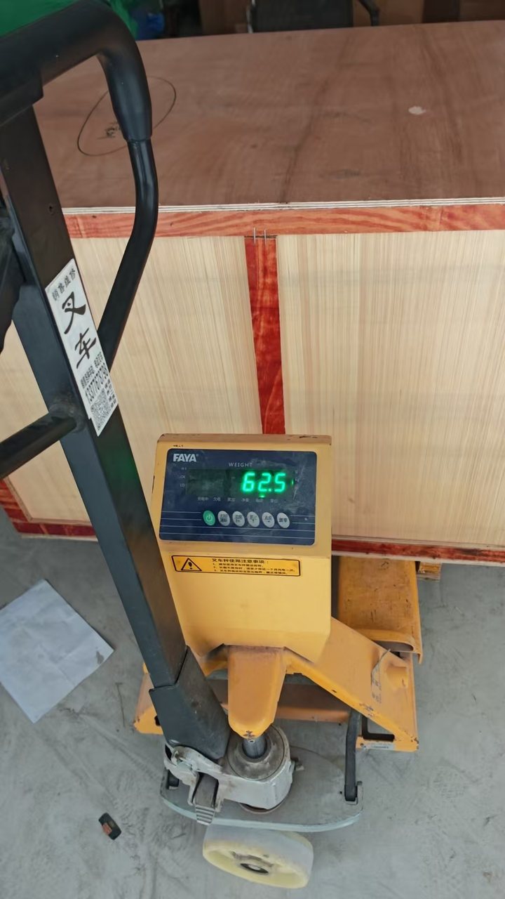 Weighing cargo on a pallet scale to record accurate shipping figures