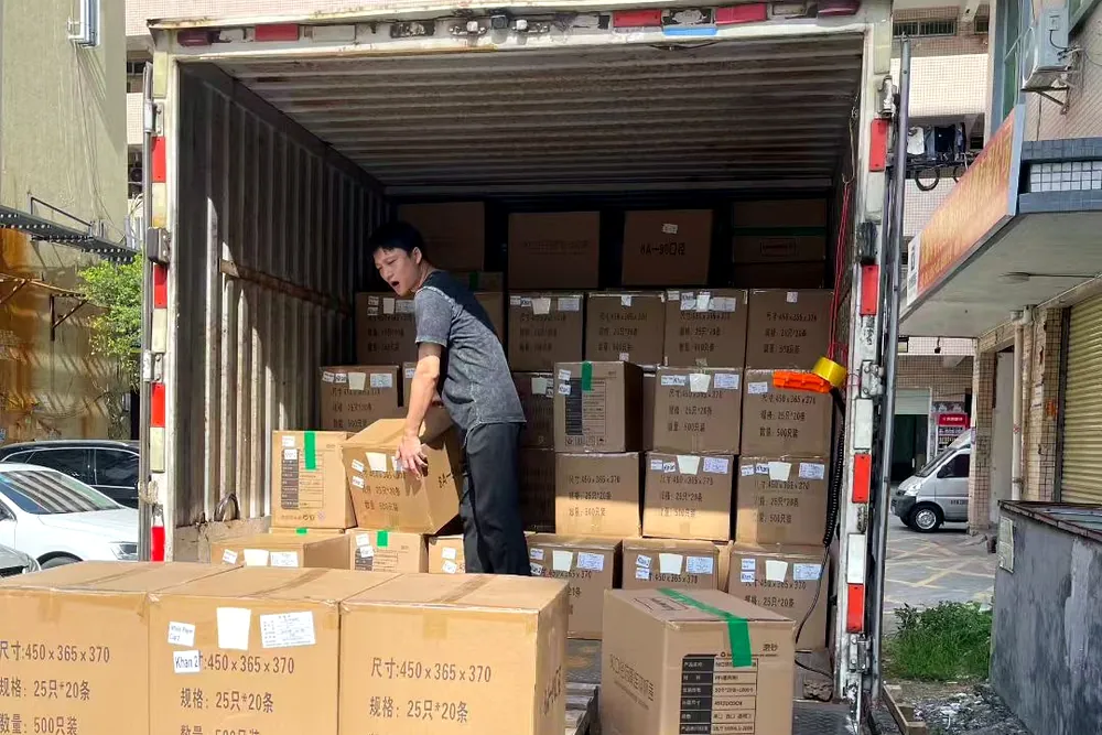 Cartons being loaded into a truck in Shenzhen