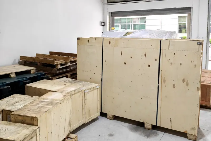 Warehouse interior with wooden export crates and pallets in Shenzhen
