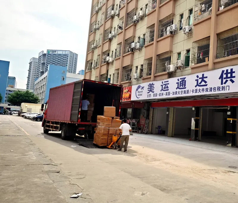Yuntuo Shenzhen warehouse entrance with a cargo truck and cartons
